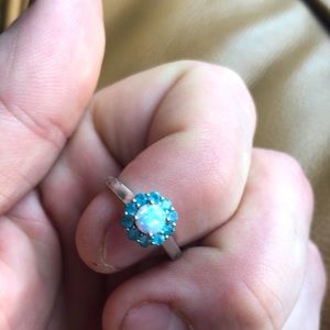 Beautiful flower design ring made with opal and topaz